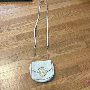 Michael Kors crossbody, cream color, gold accents, minor wear